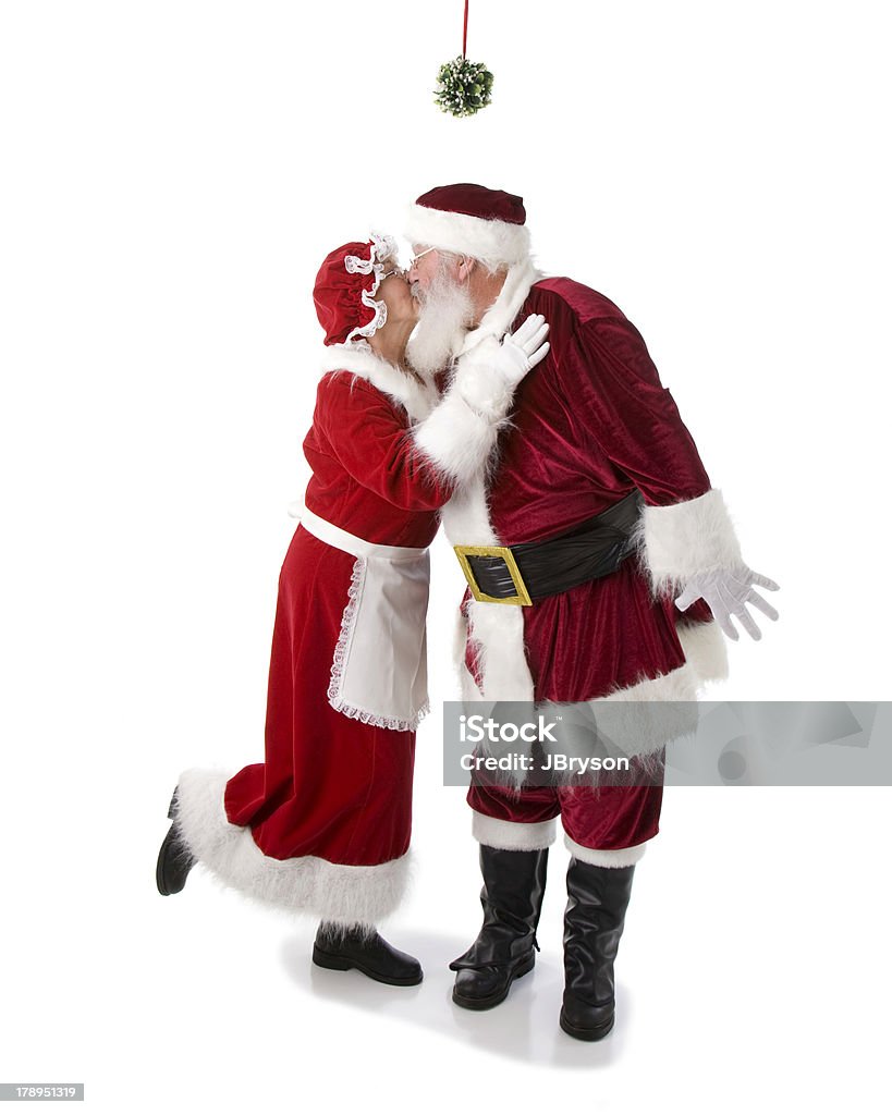 Real Santa Kisses Mamãe Noel em Visco - Royalty-free Mãe Natal Foto de stock