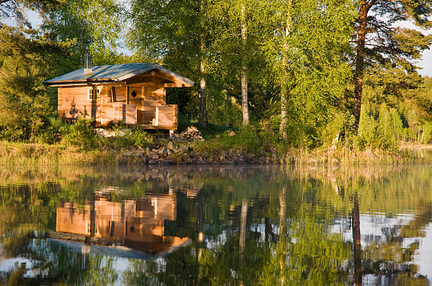 istock Log cabin on the lake 178951360