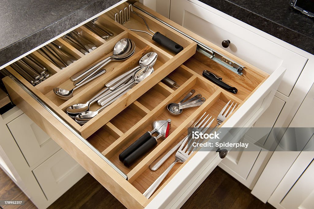 Silverware Drawer Kitchen silverware drawer with compartments. Kitchen Stock Photo