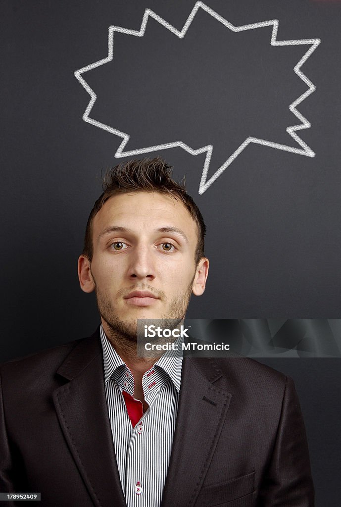 Hombre joven y discurso de pensamiento - Foto de stock de Adulto libre de derechos