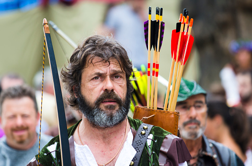 Pontevedra, Spain - September 6, 2014: An archer with arrows and clothed in time, in medieval festival held each year in the historical district of the city.