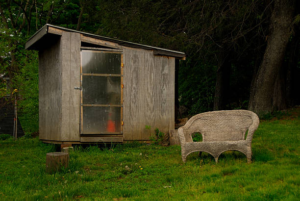istock Wood Shed and Wicker Seat 178952529