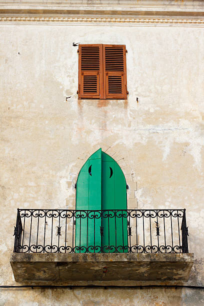 traditional, town house balcony in Calvi Corsica stock photo