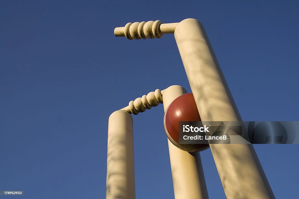 Clean bowled Cricket stumps shattered by the new ball.See also: Sport of Cricket Stock Photo