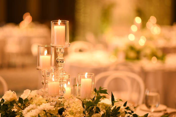 istock Close up of wedding table candles with flower decorations 1789530000