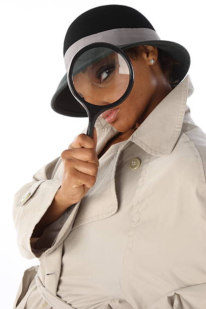 istock Black Woman Detective Looking for Clues 178953602