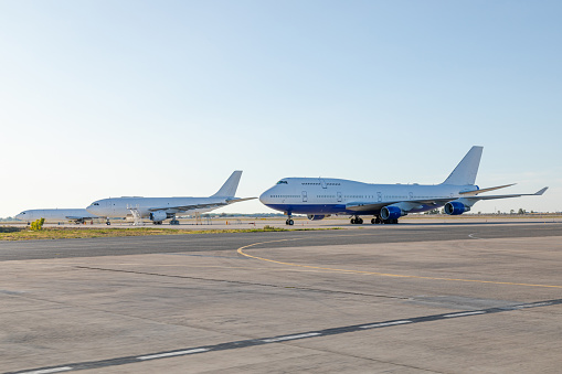 Technical review of cargo airplanes at Miami International Airport.