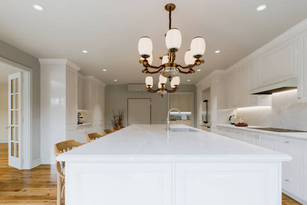 istock Kitchen white countertop with white marble, with blurred bokeh background. Presentation of goods in the kitchen interior on the countertop surface. 3D rendering 1789554803