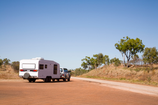 A typical Outback touring rig heads back onto the road at a Western Australian rest area. More Australia