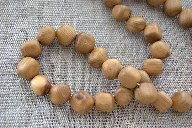 istock Wooden beads on burlap 178956787