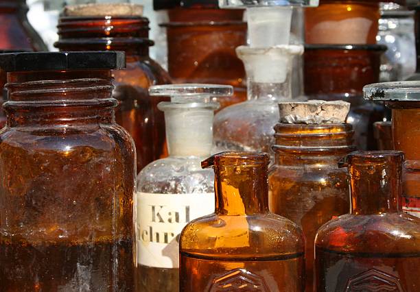 istock Old medicine bottles in sunlight 178957282