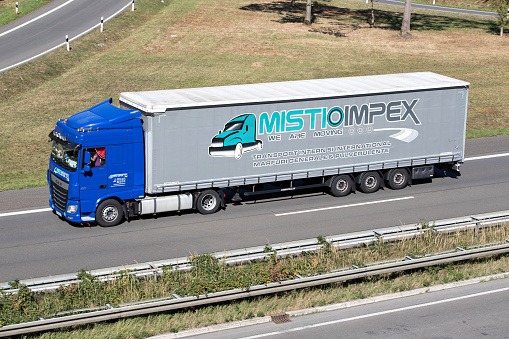 Engelskirchen, Germany - September 21, 2019: Mistio Impex DAF XF truck with curtainside trailer on motorway