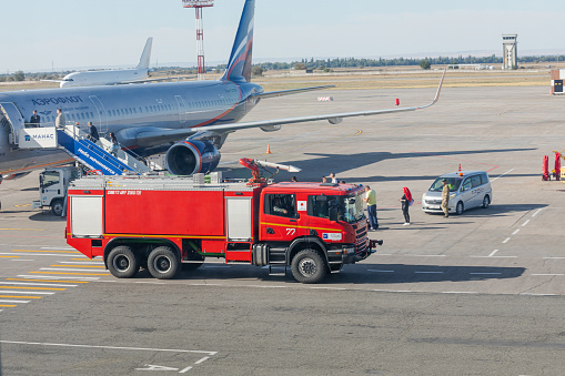 Bishkek, Kyrgyzstan - September 26, 2023: Fire engine vehicle at the Manas International Airport