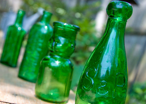 Antique green glass bottles