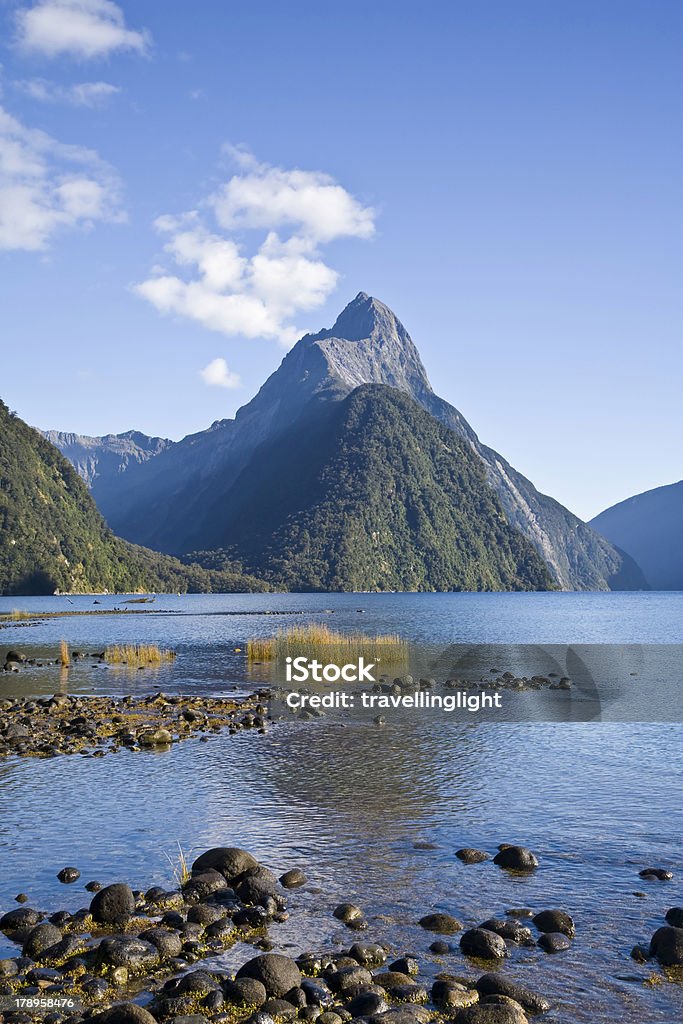 Mitre Peak in Milford Sound, New Zealand "Mitre Peak is the best known feature of Milford Sound, in New Zealand's Fiordland. More New Zealand:-" Cloud - Sky Stock Photo