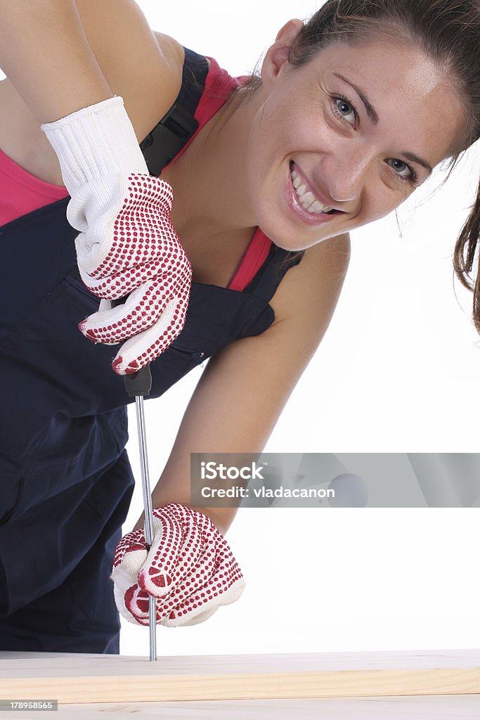 woman carpenter at work woman carpenter at work on white background Adult Stock Photo