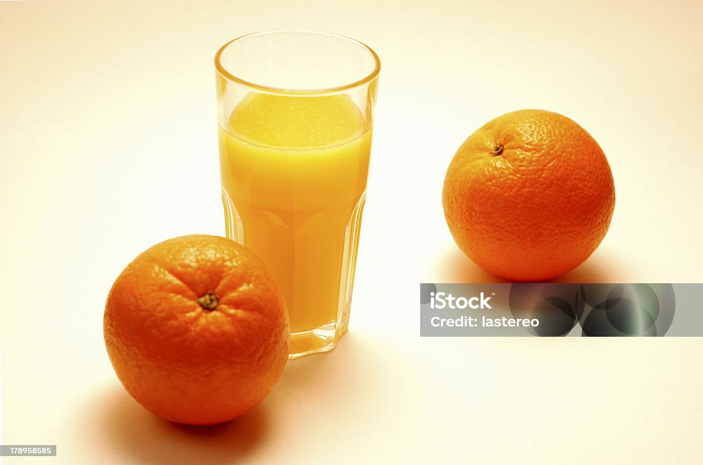 Frischer Orangensaft - Foto stock royalty-free di Agrume