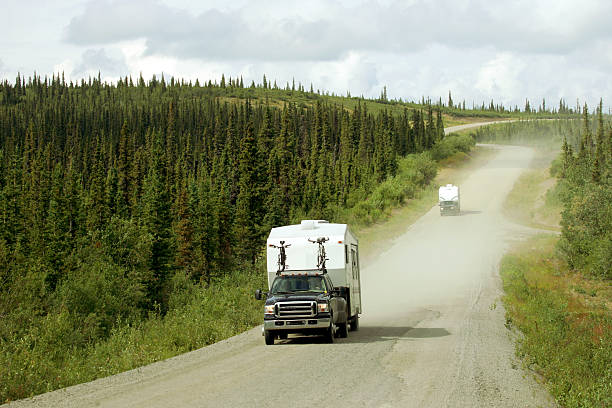 a powerful truck with a travel trailer in tow