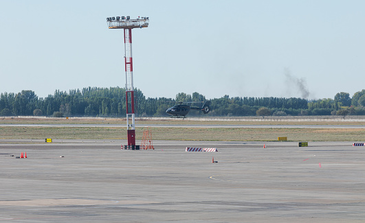 Bishkek, Kyrgyzstan - September 26, 2023: Flying Airbus H145 helicopter at the Manas International Airport