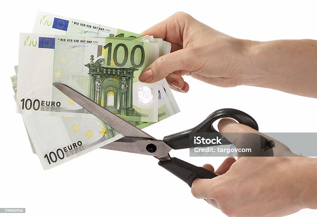 Scissors and euro. Scissors and euro. Isolated Business Stock Photo