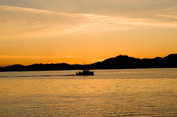 istock Sunset with a fishing boat 178961812