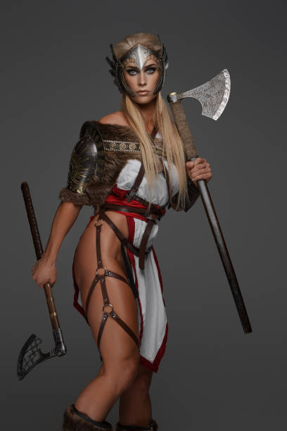 istock Viking Valkyrie. Muscular Warrior with Dual Axes 1789618344