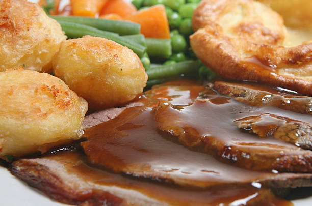Traditional Sunday roast beef dinner with Yorkshire pudding, Shallow DoF.
