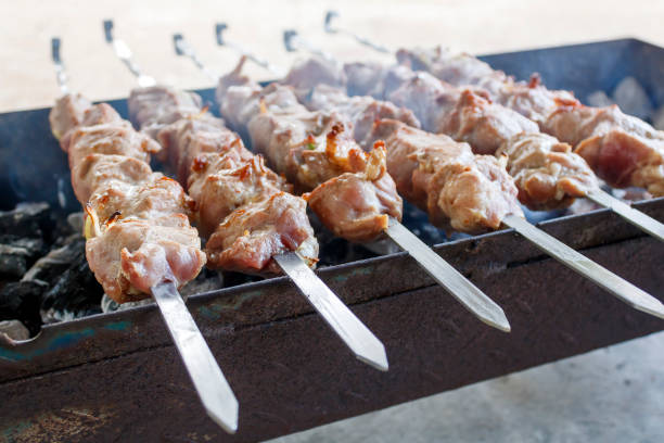 istock Meat skewers grilled on barbecue grill 1789622144
