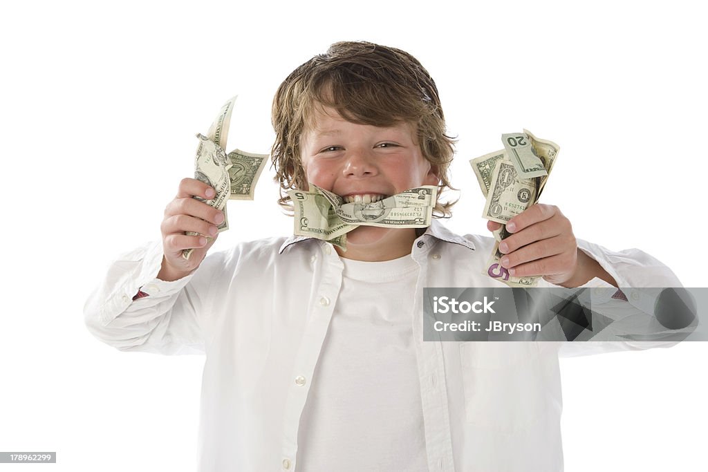 Fists Full of Money Young boy has too much money to hold in two hands.. A dream come true! Indulgence Stock Photo