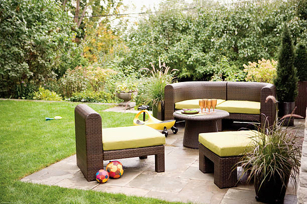 istock Backyard patio with furniture and greenery 178963851