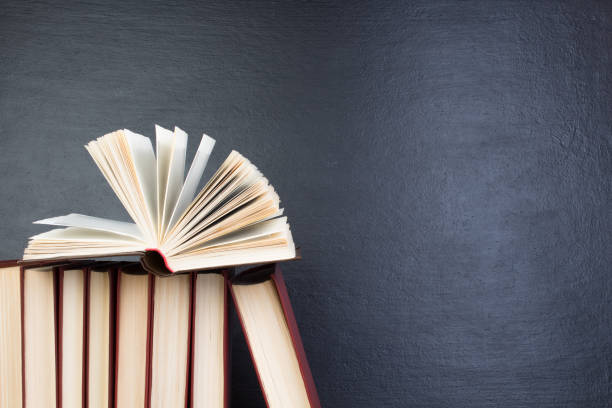 istock open book, books on the school board. Back to school. Education. Copy space for text. 1789640791