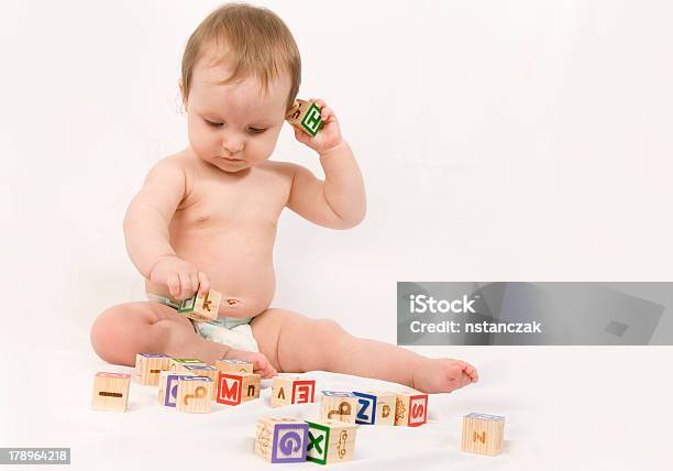 Baby Learning Stock Photo - Download Image Now - 6-11 Months, Alphabet, Baby - Human Age