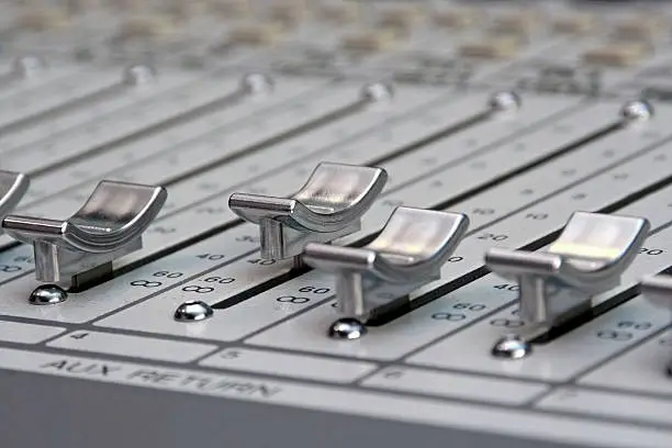 Fader of a mixing console in the recording studio
