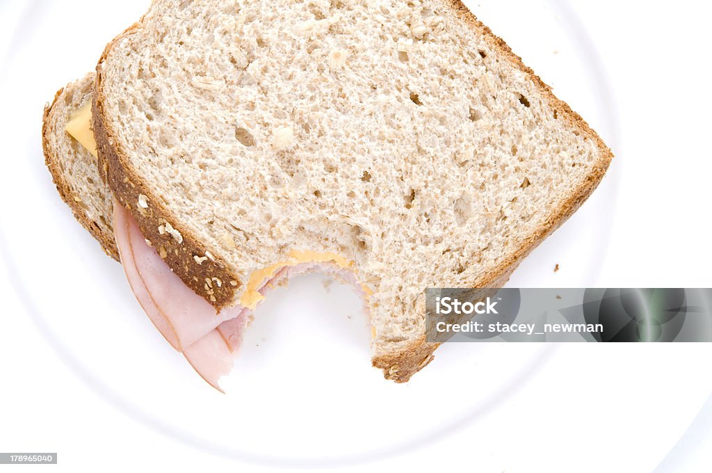 Ham &amp; Cheese, Missing Bite Ham & cheese sandwich with a missing bite. Sandwich Stock Photo