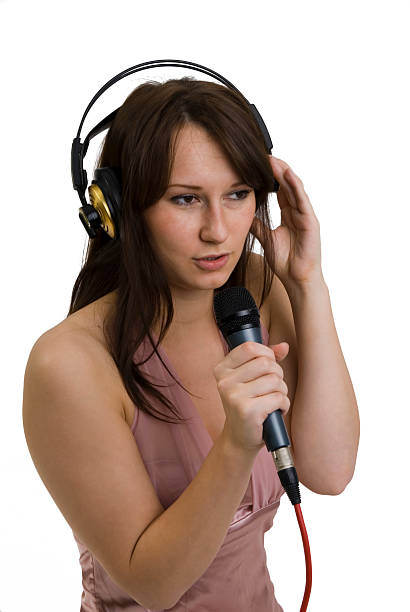 istock girl singing in microphone 178965137