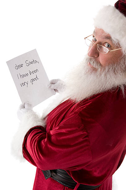 istock Real Santa Claus Reading Letter from Child 178965599