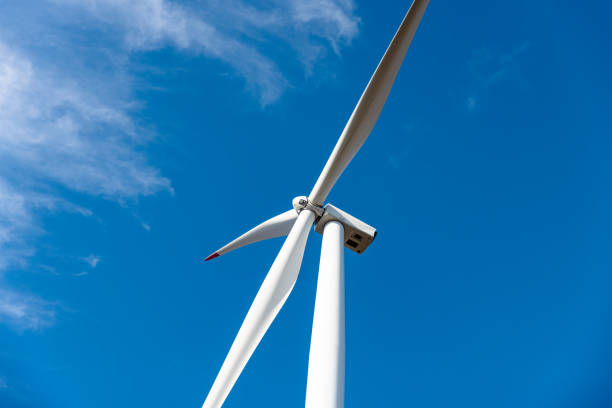 istock Wind turbine on blue sky  - Stock Photo 1789658310
