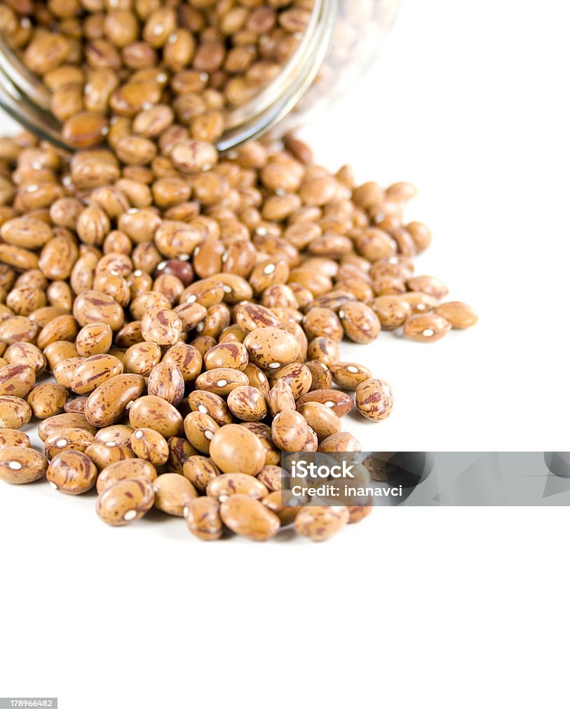 Kidney beans Brown kidney beans spilling out of jar. Brown Stock Photo