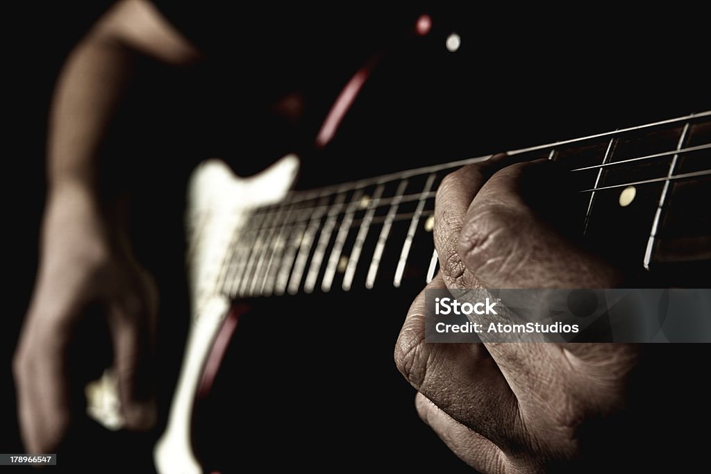 Spielt Gitarre - Lizenzfrei Bewegung Stock-Foto