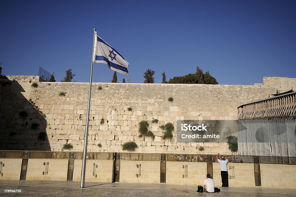 Western wall with the israeli flag Flag Stock Photo