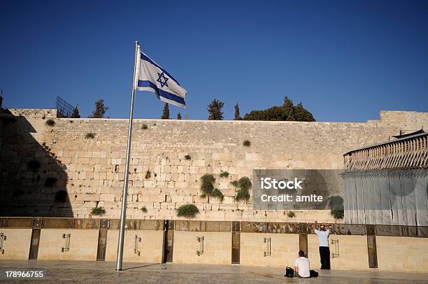 Western Wall With The Israeli Flag Stock Photo - Download Image Now - Flag, Israel, Wailing Wall