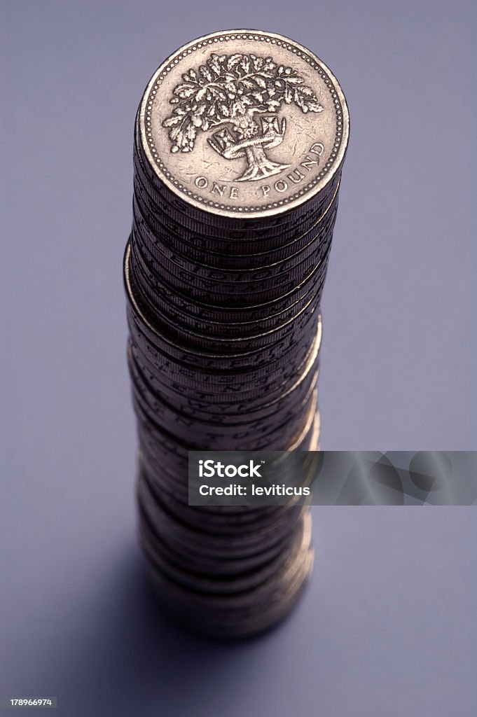 British one pound dark tower Dark times for the Sterling tower. Backgrounds Stock Photo