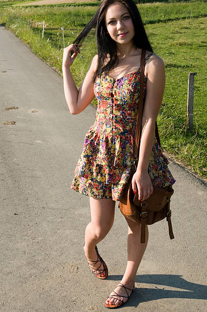 istock hitchhiker girl 178968422