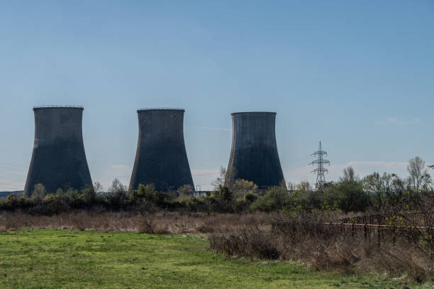 istock Cooling towers with electricity pylons 1789693266