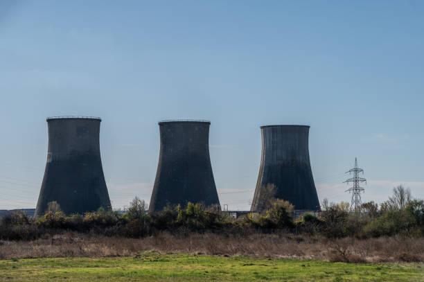 istock Cooling towers with electricity pylons 1789693270