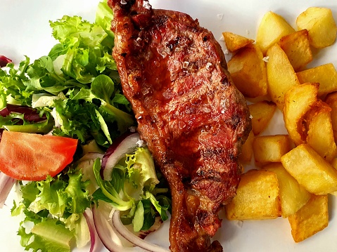 BBQ entrecote with vegetables and potatoes