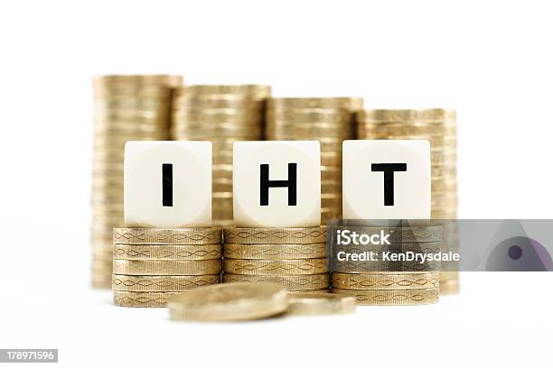 Iht On Gold Coins With White Background Stock Photo - Download Image Now