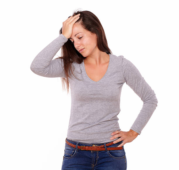 istock Tired young woman having a headache 178971778