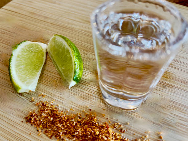 istock Tequila Shot with lime and salt background 1789717835