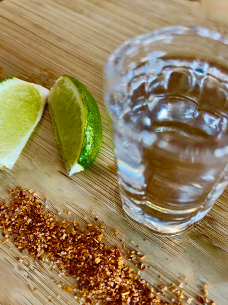 istock Tequilla Shot with lime and salt background 1789717836